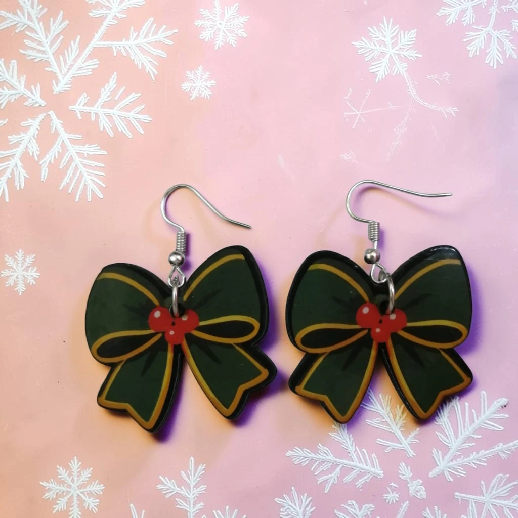 WhatsApp Image 2026-10-26 at 11.45.32 AM (6) ARETES DE NAVIDAD MOÑO VERDE CON ROJO - Imagen 1
