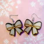 ARETES DE NAVIDAD MOÑO BLANCO CON DORADO
