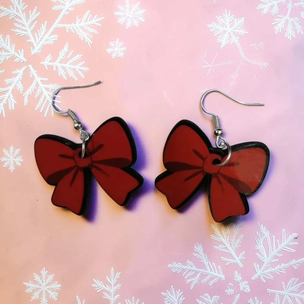 WhatsApp Image 2026-10-26 at 11.45.33 AM (7) ARETES DE NAVIDAD MOÑO ROJO LISO - Imagen 1