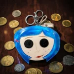 Monedero Diseño Cuero Sintético Plastificado Niña Ojos de Botón